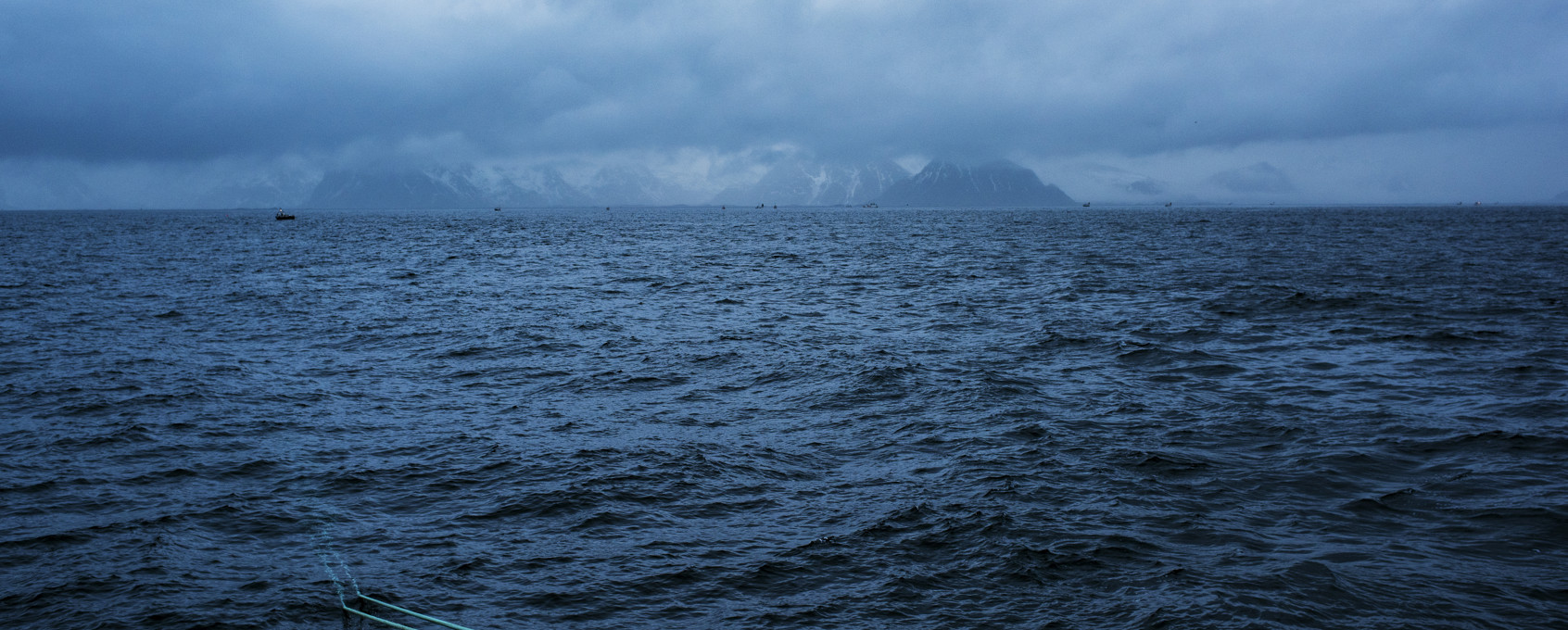 Blue ocean with rope from fishing boat