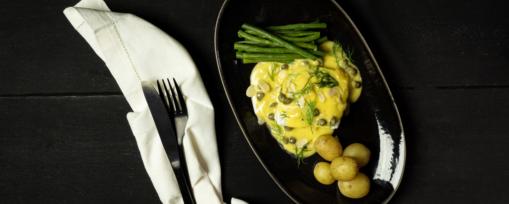 Kveite med hvitvinssaus og kapers