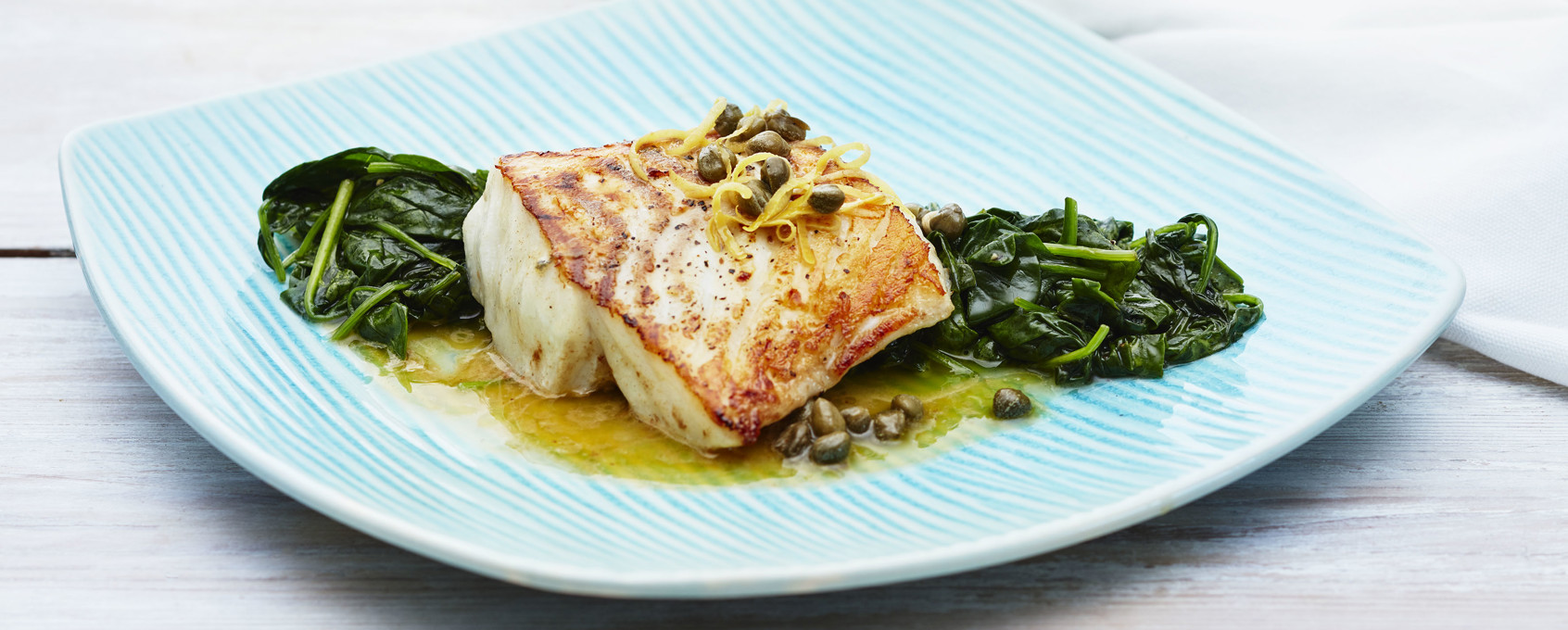 Torskeloin med spinat og kaperssmør